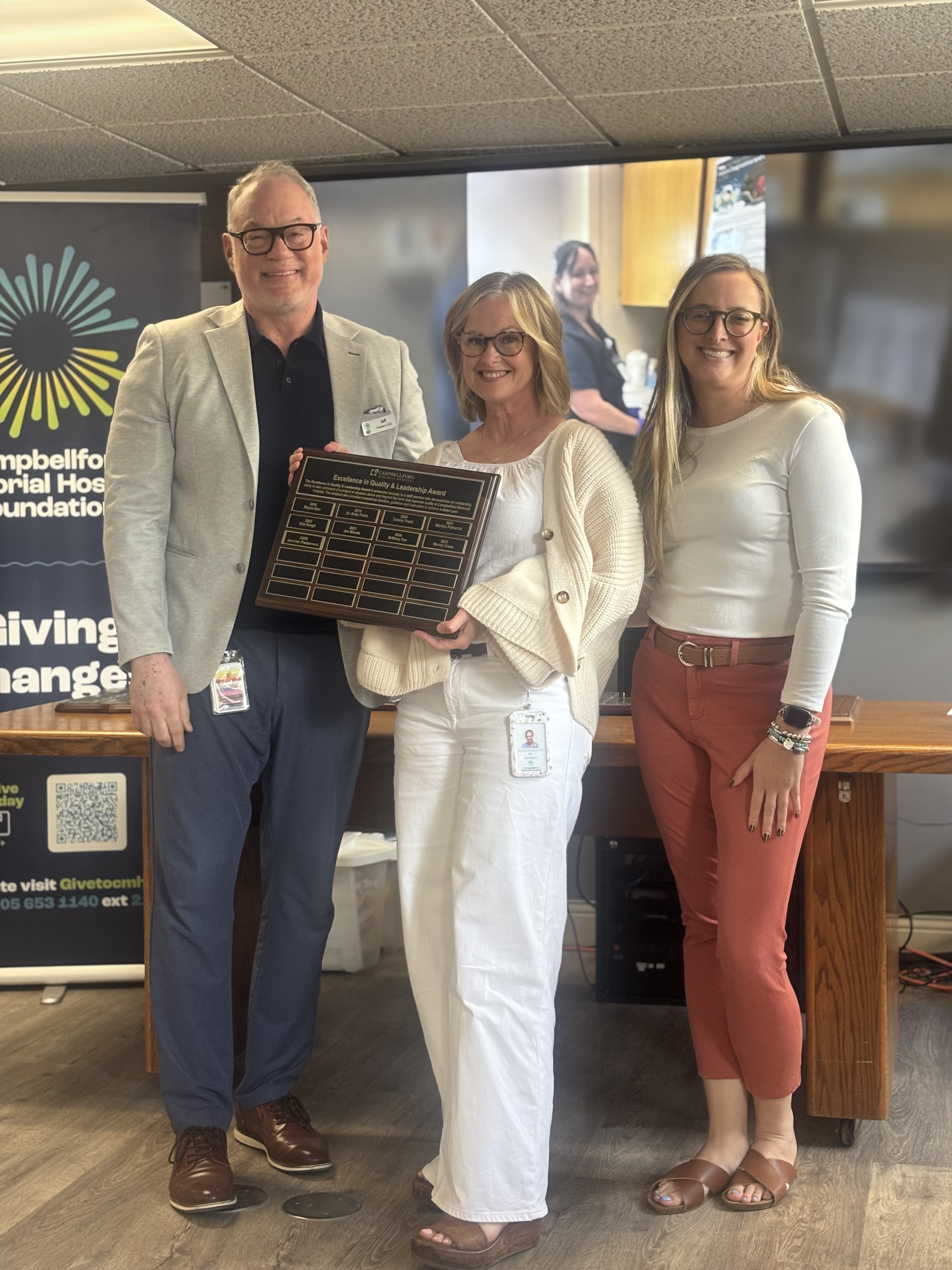 Jennifer Parliament receiving award
